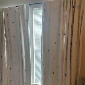 Pillowfort white with charcoal tag 4 panel curtains.